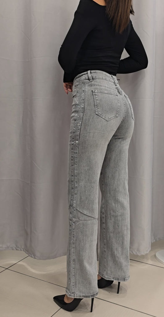 Jeans a sigaretta con dettagli brillantini ai lati