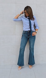Jeans con dettagli a fiocco