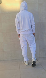 Tuta con tasconi laterali