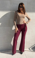 Pantalone a zampa con cinturino