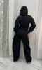 Tuta black con cappuccio