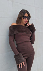 Tuta Masà collection con dettagli in pelliccia