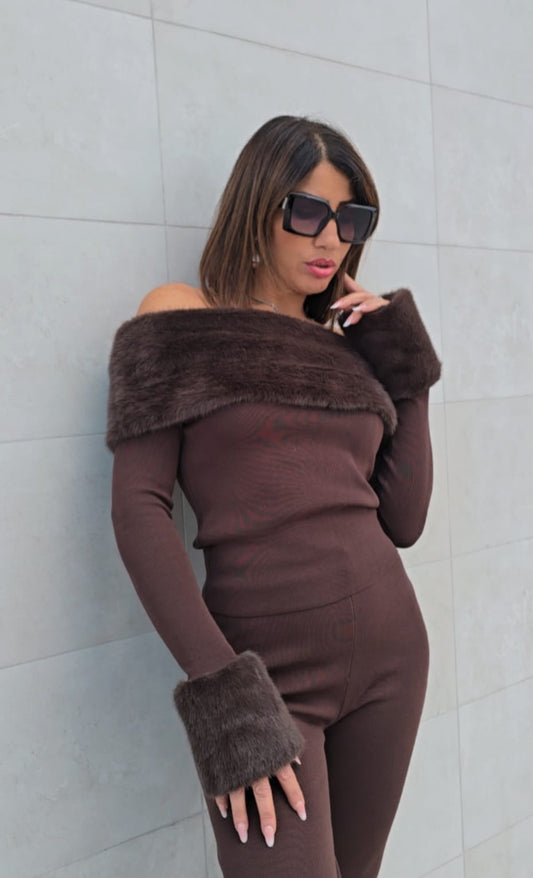 Tuta Masà collection con dettagli in pelliccia