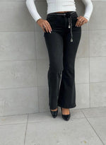 Jeans a zampa con catenina