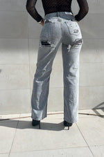 Jeans a palazzo con dettagli