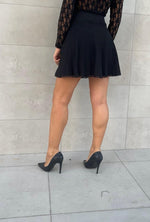 Gonna a campana con dettagli in pizzo